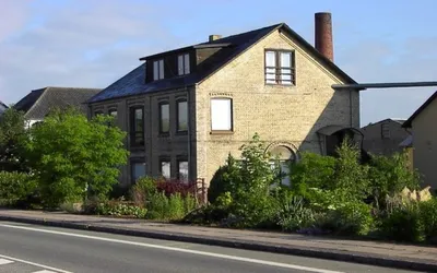 Nyrenoveret 3-værelses lejlighed med haveadgang i Langeskov